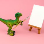 Dinosaure tenant un pinceau : illustre l'inspiration